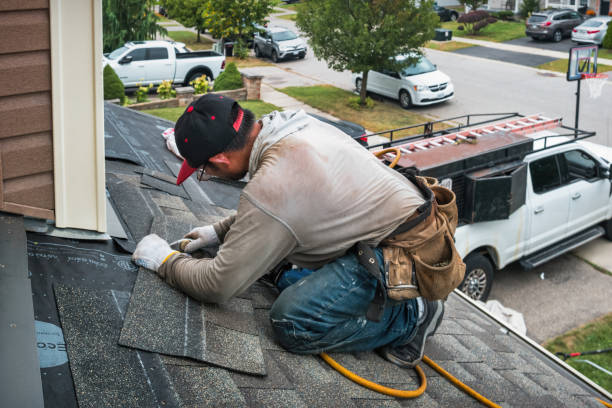 Professional Roofing technician working in Ramey, PA
